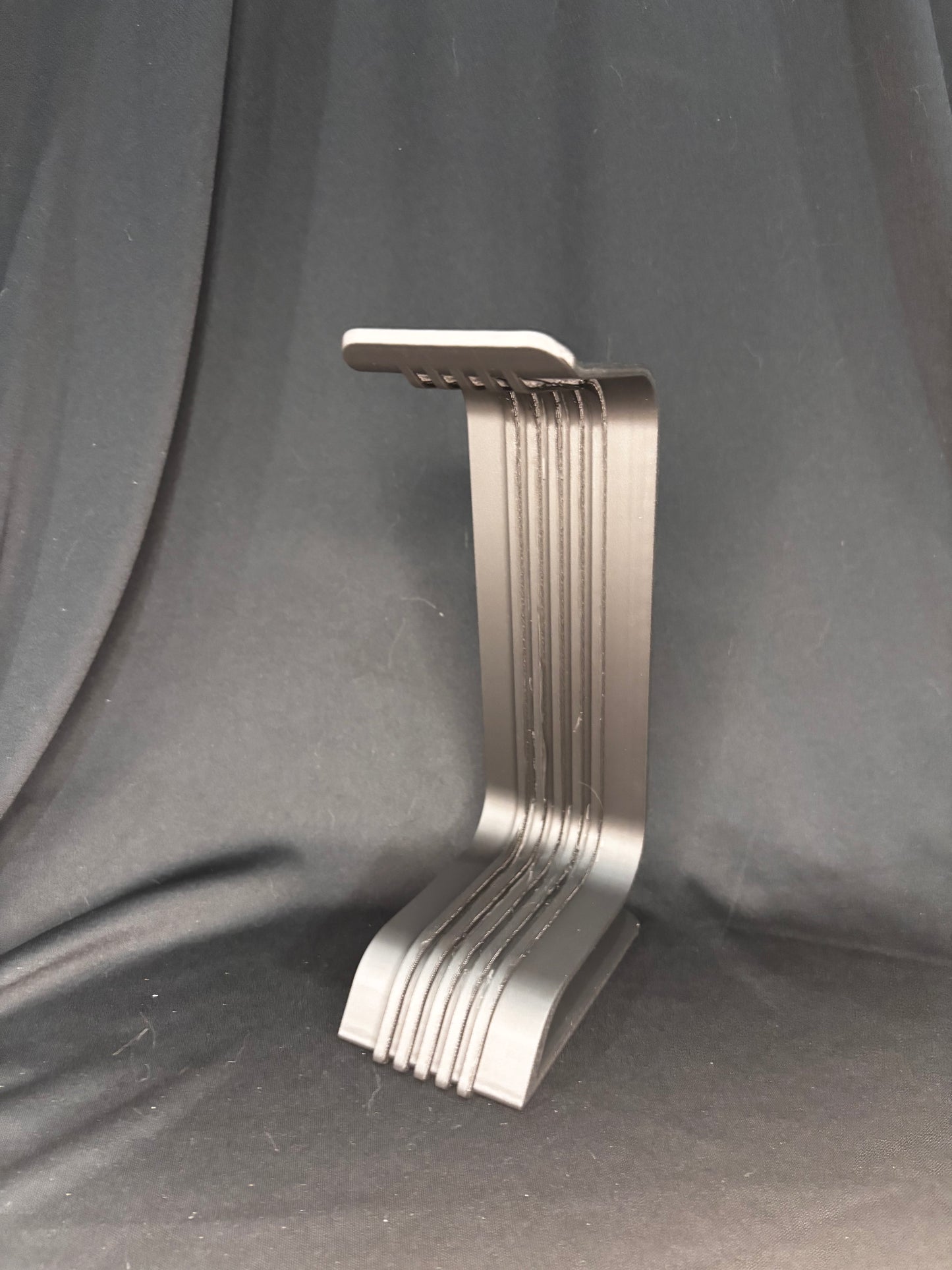 Black sleek headphone stand